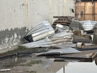 thunderstorm-damaged-building-shed